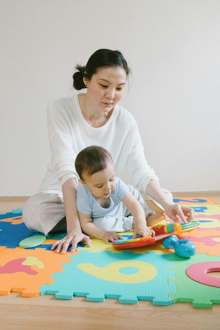 Welcoming infant room with colorful play areas